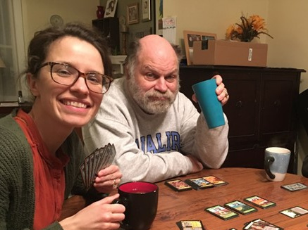 Rebekah and Dave sit together during a game night at Abbey house